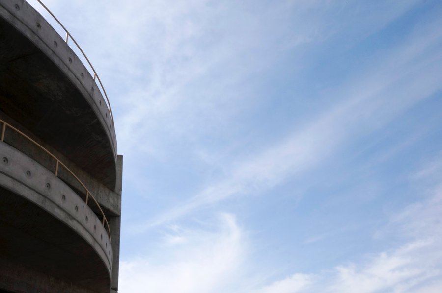 Curved garage structure