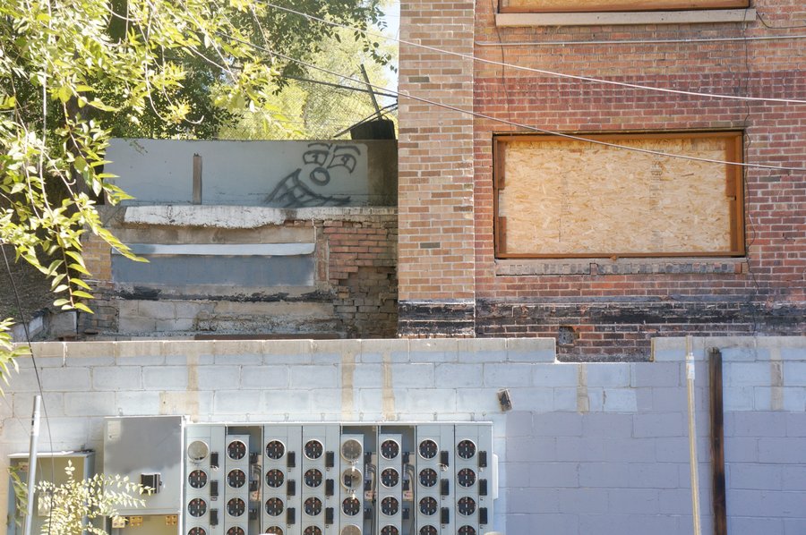 Electric meters on brick wall